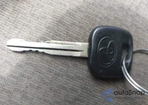 2004 Toyota Corolla Le from USA, damaged, VIN 1NXBR32E44Z249209